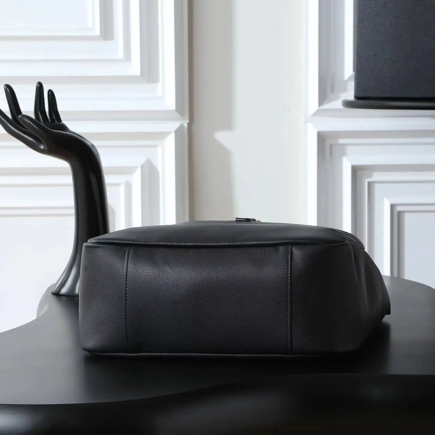 Large black soft-grain leather shoulder tote, with an adjustable wide strap and an open-top design.-2