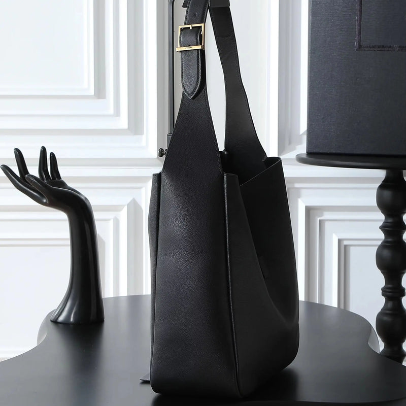 Large black soft-grain leather shoulder tote, with an adjustable wide strap and an open-top design.-1
