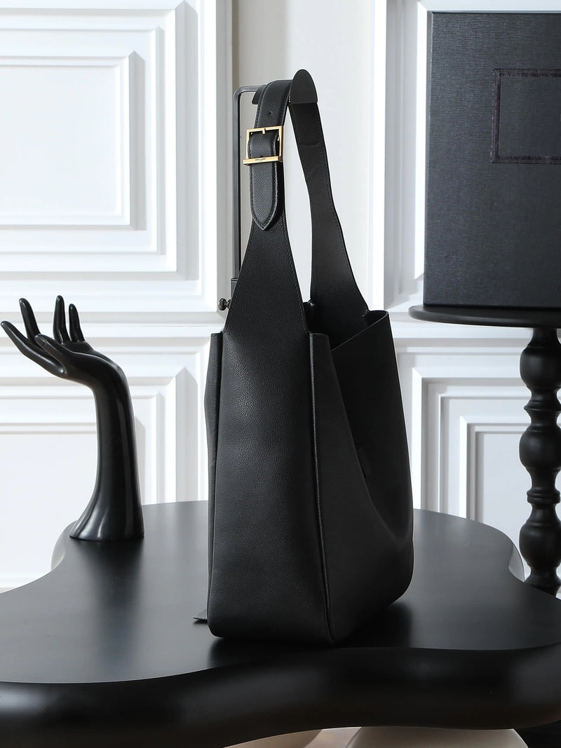 Large black soft-grain leather shoulder tote, with an adjustable wide strap and an open-top design.-4
