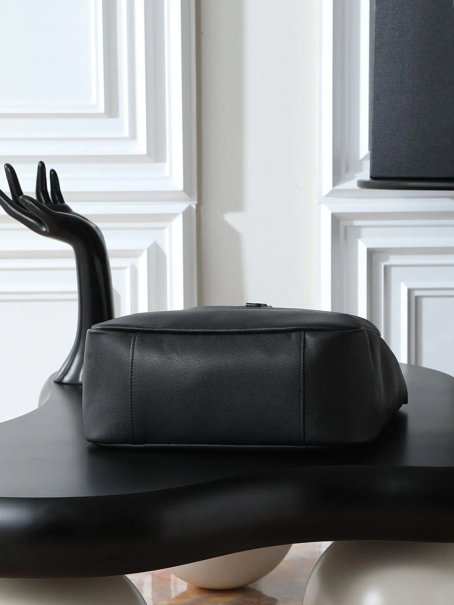 Large black soft-grain leather shoulder tote, with an adjustable wide strap and an open-top design.-5